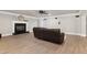 Spacious living room featuring a fireplace, hardwood floors, and neutral paint colors at 4001 Belmont Forest Way, Raleigh, NC 27606