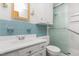 Bathroom featuring a toilet, shower, tiled wall, and a vanity sink at 4298 Old Stage S Rd, Erwin, NC 28339