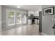 Bright kitchen with stainless steel appliances, modern backsplash, and ample natural light at 500 W Woodcroft Pkwy # 13D, Durham, NC 27713