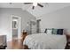 Main bedroom features wood floors and an ensuite bathroom at 500 W Woodcroft Pkwy # 13D, Durham, NC 27713