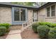 Charming brick home featuring a welcoming front entrance with well-maintained landscaping at 500 W Woodcroft Pkwy # 17C, Durham, NC 27713