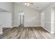 Spacious living room features new floor, chair rail, and vaulted ceiling at 500 W Woodcroft Pkwy # 17C, Durham, NC 27713
