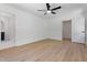 Spacious bedroom with luxury vinyl flooring and ensuite bathroom entrance at 5022 Mockingbird Ln, Sanford, NC 27332