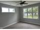 Spacious bedroom with lots of natural light and neutral colors, creating a calm and inviting atmosphere at 520 S Lincoln St, Benson, NC 27504