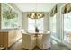 Bright dining room featuring a round table, stylish seating, and a view of the outdoors at 5265 Aleppo Ln, Raleigh, NC 27613