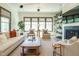 Inviting living room features modern decor, a cozy fireplace, and large windows for ample light at 5265 Aleppo Ln, Raleigh, NC 27613