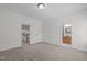 Bedroom leading to staircase and ensuite bathroom at 5504 Spring Bluffs Ln, Raleigh, NC 27606