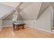 Game room with hardwood floors, pool table, recessed lighting, and vaulted ceilings at 5504 Spring Bluffs Ln, Raleigh, NC 27606
