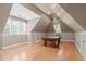 Spacious game room with hardwood floors, recessed lighting, and a pool table at 5504 Spring Bluffs Ln, Raleigh, NC 27606