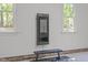 Home gym area with workout equipment and natural lighting from large windows at 5504 Spring Bluffs Ln, Raleigh, NC 27606