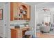 A cozy office nook with desk space, drawers, shelves, and a comfortable chair for remote work at 5504 Spring Bluffs Ln, Raleigh, NC 27606