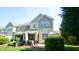 View of the backyard with the exterior of a multi-story house and patio at 5901 Chivalry Ct, Raleigh, NC 27612