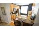 A cozy kitchen featuring stainless steel appliances, granite counters, and wooden cabinets at 5901 Chivalry Ct, Raleigh, NC 27612
