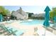 Large pool with plenty of lounge chairs and tables surrounding at 5901 Chivalry Ct, Raleigh, NC 27612
