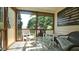 Relaxing screened porch with comfortable seating and serene outdoor views at 5901 Chivalry Ct, Raleigh, NC 27612