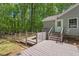Back deck with outdoor space for relaxing and enjoying scenic views at 6614 Chantilley Place, Bahama, NC 27503