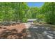 Charming home featuring a long driveway and beautiful natural surrounding at 6614 Chantilley Place, Bahama, NC 27503