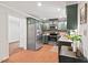 Well-appointed kitchen with stainless steel appliances and plentiful counter space at 6614 Chantilley Place, Bahama, NC 27503