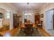 Dining room featuring hardwood floors, traditional furnishings, and lots of natural light at 7308 York, Mebane, NC 27302