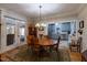 Dining Room showing traditional furnishings with views through to the Kitchen at 7308 York, Mebane, NC 27302