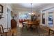 Inviting dining room with hardwood floors, a large table, and views to the Living Room at 7308 York, Mebane, NC 27302