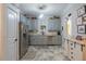 Lovely kitchen with gray cabinets, stainless appliances, and stylish flooring, creating a modern and functional space at 7308 York, Mebane, NC 27302