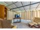 Cozy living room featuring unique ceilings, comfortable seating, and a television at 7308 York, Mebane, NC 27302