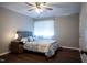 Comfortable bedroom with wood floors, large window, and soft, inviting bedding at 861 Dalewood Dr, Raleigh, NC 27610