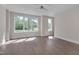 Spacious bedroom with ceiling fan and windows providing plenty of natural light at 1012 Manor Way, Durham, NC 27701