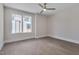 An empty bedroom with hardwood floors and a ceiling fan at 1012 Manor Way, Durham, NC 27701