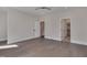 View of a bedroom featuring an opened closet and hardwood floors at 1012 Manor Way, Durham, NC 27701