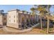 Modern townhome exteriors showcase multi-toned brick, multiple balconies, and clean architectural lines at 1012 Manor Way, Durham, NC 27701