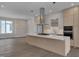 Spacious kitchen with a large island and stainless steel appliances, open layout at 1012 Manor Way, Durham, NC 27701