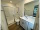 Clean bathroom featuring tiled shower and modern vanity at 10527 Brookside Reserve Rd, Raleigh, NC 27614
