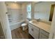 Bright bathroom featuring a tub/shower, toilet, and a vanity with a light countertop at 10527 Brookside Reserve Rd, Raleigh, NC 27614