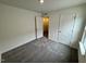 Cozy bedroom with plush carpeting and closet at 10527 Brookside Reserve Rd, Raleigh, NC 27614