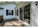 The home has a wooden back porch and a sliding glass door at 107 Piquot Dr, Louisburg, NC 27549