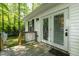 Charming deck with white railing and glass door providing access to the outdoors and natural light at 107 Piquot Dr, Louisburg, NC 27549