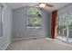 Cozy dining area featuring vaulted ceilings, a ceiling fan, and neutral carpeting at 107 Piquot Dr, Louisburg, NC 27549