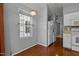 The kitchen features a window and hardwood flooring at 107 Piquot Dr, Louisburg, NC 27549
