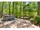 Relax and unwind in this private backyard oasis with a hot tub and beautiful natural setting at 109 Bessemer Pl, Durham, NC 27712