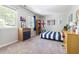 Stylish bedroom features soft carpet, ample natural light, and modern furnishings for relaxation and comfort at 109 Bessemer Pl, Durham, NC 27712