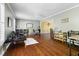 Spacious living room with hardwood floors, ample natural light, and neutral color palette at 109 Bessemer Pl, Durham, NC 27712