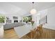 Elegant dining area with an open layout, connecting to a cozy living area at 1101 Norris St, Raleigh, NC 27604