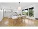 Bright dining area with pendant lighting and views of the modern kitchen at 1101 Norris St, Raleigh, NC 27604
