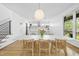 Bright dining room featuring an open floor plan with stylish modern design elements at 1101 Norris St, Raleigh, NC 27604