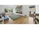 Bright, spacious living room with hardwood floors, tall ceilings, and large windows at 1101 Norris St, Raleigh, NC 27604