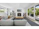 Inviting living room features a cozy fireplace and a wall of built-in bookcases at 1101 Norris St, Raleigh, NC 27604