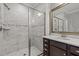 Bathroom featuring a glass-enclosed shower with gray tile surround and a modern single vanity at 1104 Covered Bridge Trl, Chapel Hill, NC 27517