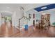 Elegant dining room with hardwood floors, a decorative chandelier, and blue accent paint at 1104 Covered Bridge Trl, Chapel Hill, NC 27517
